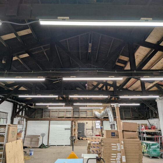 64 / 96 / 120 Watt Adjustable LED Vapor Tight Light: installation in shop