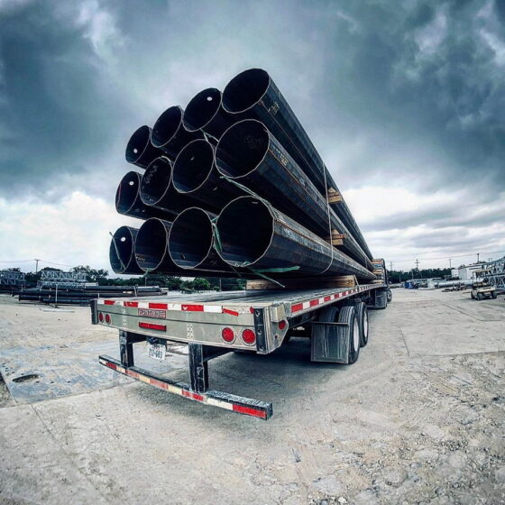 50 Foot Stadium Light Pole: poles on truck bed