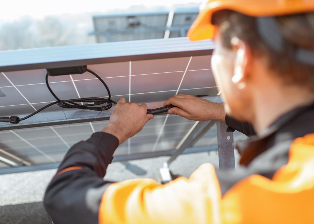 Electrician installing solar