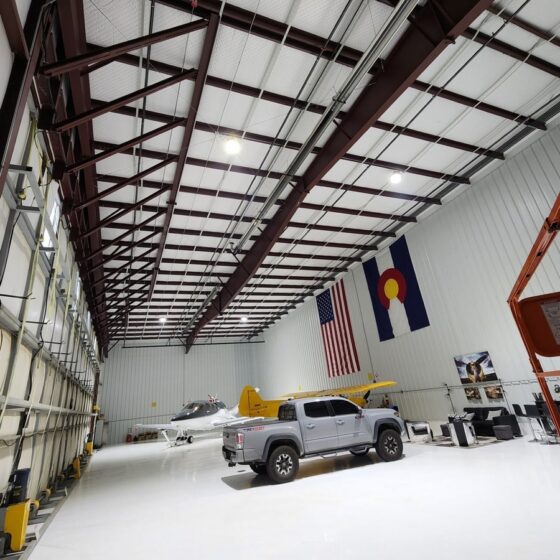 250 / 375 / 500 Watt Adjustable UFO LED High Bay: installation view in aircraft hangar